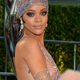 Illustration for article titled TLC Slams Rihanna for Constant Nudity, Rihanna Throws Shade Right Back